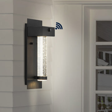 Horizone 5.5" Minimalist Industrial Iron/Glass Seeded Glass with Dusk-to-Dawn Sensor Integrated LED Outdoor Sconce - JONATHAN Y